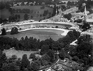 <b class=qtipBold><figcaption>Royal Crescent EPW001949</figcaption></b><br>BATH, Somerset. Aerial view of the Royal Crescent, Bath, built between 1767 and 1774 by John Wood. It is considered amongst the greatest examples of Georgian architecture. Photographed in July 1920. Aerofilms Collection (see Links).<br><em>© Historic England</em> Royal Crescent EPW001949