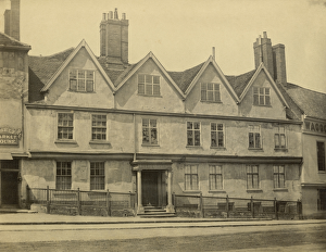 <b class=qtipBold><figcaption>Samson And Hercules House OP27177</figcaption></b><br>Samson And Hercules House, Tombland, Norwich, Norfolk. The front elevation of Samson and Hercules House, showing the building before alterations in 1890, when the figures of Samson and Hercules were inserted to support the porch. In 1944 a fire destroyed all but the ground floor. The building was subsequently rebuilt. Photographed between 1875-1880.<br><em>© Historic England Archive</em> Samson And Hercules House OP27177