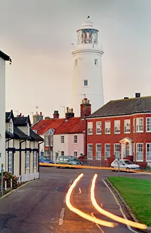 <b class=qtipBold><figcaption>Southwold Lighthouse N050067</figcaption></b><br>SOUTHWOLD, Suffolk. Traffic passes the lighthouse at dusk.<br><em>© English Heritage</em> Southwold Lighthouse N050067