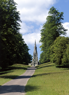 <b class=qtipBold><figcaption>St Mary's Church K021143</figcaption></b><br>ST MARY'S CHURCH, Studley Royal, North Yorkshire. Exterior view looking west up the avenue. Built during the 1870's by architect William Burges. Victorian Gothic.<br><em>© Historic England</em> St Mary's Church K021143