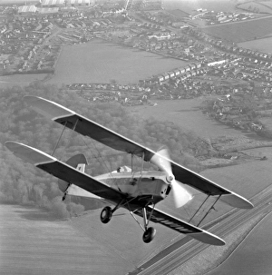 <b class=qtipBold><figcaption>Stampe aircraft EAW221481</figcaption></b><br>"Stampe" aircraft in flight. Aerofilms Collection (see Links).<br><em>© Historic England</em> Stampe aircraft EAW221481
