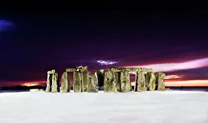 <b class=qtipBold><figcaption>Stonehenge at twilight N090035</figcaption></b><br>STONEHENGE, Wiltshire. General view of Stonehenge at twilight showing recent snowfall.<br><em>© Historic England</em> Stonehenge at twilight N090035