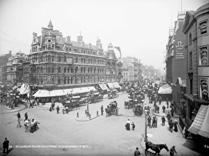 <b class=qtipBold><figcaption>Victorian street scene CC97_01521</figcaption></b><br>Tottenham Court Road, London. A view looking down a busy Tottenham Court Road from Oxford Street with horse-drawn vehicles and people in the foreground. A large clothing department store lies on the corner where the two roads meet. Photographed by York and Son in the 1890s.<br><em>© Historic England Archive</em> Victorian street scene CC97_01521