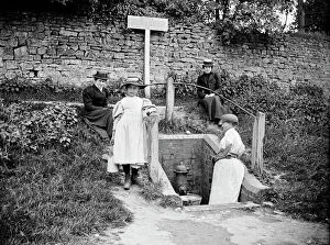 Victorian people and costumes Collection: At the village water pump a97_05320