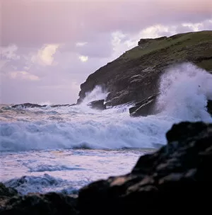 Tintagel Castle Gallery: Waves crashing against the coastline K900459