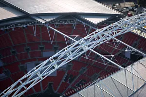 <b class=qtipBold><figcaption>Wembley Stadium 24391_025</figcaption></b><br>WEMBLEY STADIUM, London. Close up aerial view showing section of the roof, interior and arch.<br><em>© Historic England</em> Wembley Stadium 24391_025