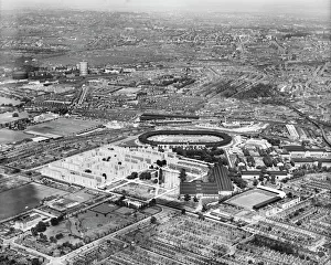<b class=qtipBold><figcaption>White City Estate, 1939 EPW062152</figcaption></b><br>The London County Council White City Estate, Olympic Stadium and Loftus Road football ground, Shepherd's Bush, London, from the south-west, 9th July 1939. Queen's Park Rangers FC. QPR.<br><em>© Historic England Archive</em> White City Estate, 1939 EPW062152