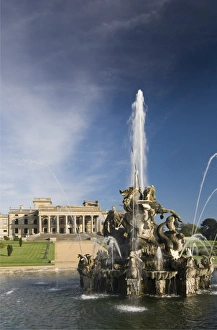 <b class=qtipBold><figcaption>Witley Court N071288</figcaption></b><br>WITLEY COURT AND GARDENS, Worcestershire.The Perseus and Andromeda fountain and water spouts with house and parterre garden beyond.<br><em>© Historic England</em> Witley Court N071288