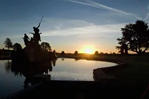 <b class=qtipBold><figcaption>Witley Court N071291</figcaption></b><br>WITLEY COURT AND GARDENS, Worcestershire. The pool of the fountain at sunrise.<br><em>© Historic England</em> Witley Court N071291