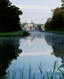 <b class=qtipBold><figcaption>Wrest Park Gardens K020817</figcaption></b><br>WREST PARK HOUSE AND GARDENS, Silsoe, Bedfordshire. The Pavilion 1709-11 by Thomas Archer. Baroque design. Dawn view across a misty Long Water.<br><em>© Historic England</em> Wrest Park Gardens K020817