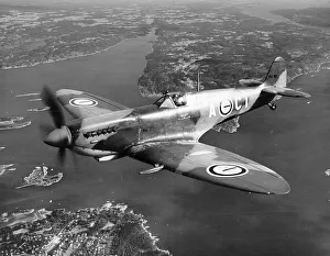 <b class=qtipBold><figcaption>Supermarine Spitfire</figcaption></b><br>Supermarine Spitfire LF.IXe (NH193 A-CI) of 331 Squadron Royal Norwegian Air Force, in flight over Oslo Fjord, June 1949<br><em>© RAF Museum 2008 - All Rights Reserved</em> Supermarine Spitfire
