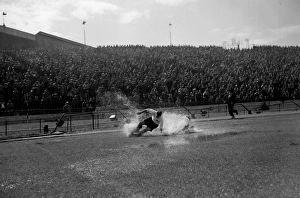 <b class=qtipBold><figcaption>TOM FINNEY</figcaption></b><br>Pa News Photo 25/8/56 Tom Finney England and Preston North End Forward in a Shower of Water Spray which Almost Completely Hides Chelsea Left-Back Bellet as they Tussle for the Ball on the Soaked Pitch at Stamford Bridge, London TOM FINNEY