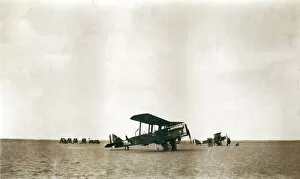 Support Gallery: Two biplanes with ground support vehicles, Iraq