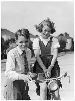 Seated Collection: Boy & Girl with Bicycle