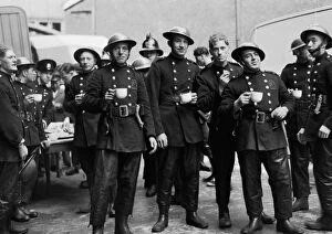 Dock Collection: Firefighters on a tea break after fire St Katherines Dock