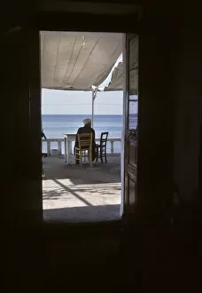 Enjoying Collection: Man in Mediterranean cafe, Thassos