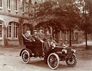 Seated Collection: Four men in a car
