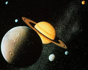Voyager I composite of Saturn & six of its moons