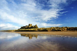 Castle Gallery: England, Northumberland, Bamburgh Castle. Bamburgh Castle and dunes near Bamburgh village