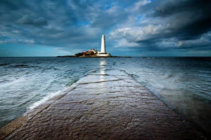 Coast Gallery: England, Tyne and Wear, Whitley Bay. Incoming tide engulfs the causeway linking St Marys Island & lifehouse to