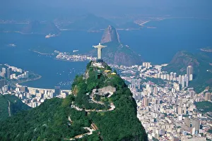 Aerial view of Rio de Janeiro with the Cristo Redentor (Christ the Redeemer) in the foreground Aerial view of Rio de Janeiro with the Cristo Redentor (Christ the Redeemer) in the foreground