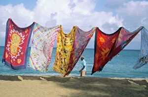 West Indian Collection: Batiks on line on the beach