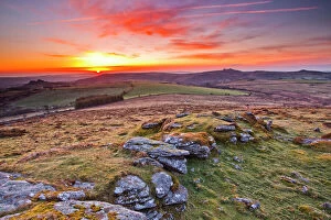 Sun Rise Gallery: A colourful dawn on Chinkwell Tor in Dartmoor National Park, Devon, England, United Kingdom, Europe