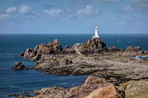 Lighthouse Collection: Corbiere Lighthouse and rocky coastline, Jersey, Channel Islands, United Kingdom, Europe