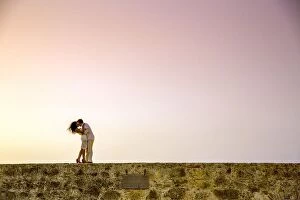 Love Collection: Couple posing on the old wall, Old Walled-in City, Cartagena, Colombia, South America