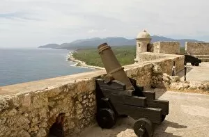 Cuban coastline and the Castillo del Morro, a fortess at the entrance to the Bay of Santiago