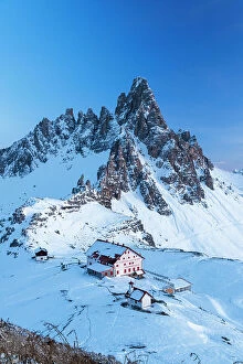 South Tyrol Collection: Dusk on Locatelli mountain hut with Paterno mountain in the background, winter view