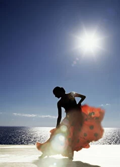 Lens Flare Collection: Flamenco dancing by sea in full sunlight, Ibiza, Spain, Europe