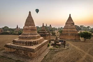 Tourist Attractions Gallery: Hot air balloon over Bagan at sunrise, Bagan (Pagan), Myanmar (Burma), Asia