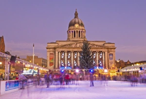 Ice skaters on the temporary Christmas outdoor ice skating rink in the Old Market Square in front of the Council House Ice skaters on the temporary Christmas outdoor ice skating rink in the Old Market Square in front of the Council House