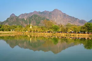 Pagoda Gallery: Lake by Kyaut Ka Latt Pagoda and mountain, Hpa-An, Myanmar (Burma), Asia