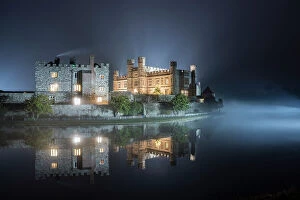 Fortification Collection: Leeds Castle illuminated in evening mist, winter, near Maidstone, Kent, England, United Kingdom