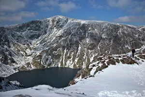 Adventure Collection: Llyn Cau and summit of Cader Idris in winter sun, Snowdonia National Park, Gwynedd, Wales