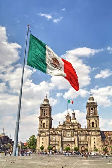 Mexico City Collection: Mexican flag, Plaza of the Constitution (Zocalo), Metropolitan Cathedral in background