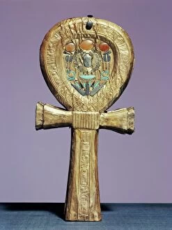 Egypt Collection: Mirror case in the form of an ankh, the sign of life, made of gilt wood inlaid with glass-paste