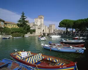Lake Garda Collection: Moored boats at Sirmione on Lake Garda, Lombardy, Italy, Europe
