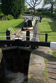 Full Body Collection: Narrow boat on the Llangollen Canal going through the locks at Grindley Brook