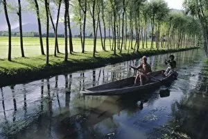 Seated Collection: Paddy fields and waterway with local boat