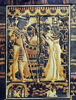 Treasure Collection: Painted ivory plaque from the lid of a coffer showing Tutankhamun and Ankhesenamun in a garden