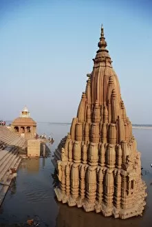 Motif Gallery: Partially submerged tilted Shiva temple below the ghats