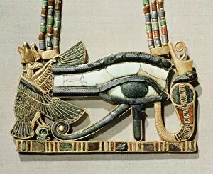 Egypt Gallery: Pectoral of the sacred eye flanked by the serpent goddess of the North
