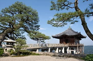 Pagoda Gallery: Picturesque Ukimido Temple pagoda resting on stilts above Lake Biwa in Otsu