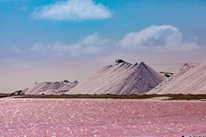 Netherlands Antilles Gallery: Pink colored ocean overlooking the Salt Pyramids of Bonaire, Netherlands Antilles