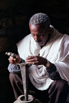 Seated Collection: Portrait of a blacksmith at work, town of Axoum (Axum) (Aksum), Tigre region