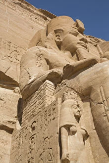 Abu Simel Collection: Ramses II statue with Queen Nefertari statue at lower left, Ramses II Temple