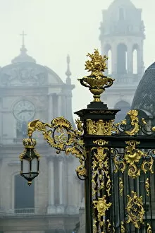 Iron Work Collection: Restored gilded wrought iron work and lamp by Lamor in the Place Stanislas in Nancy